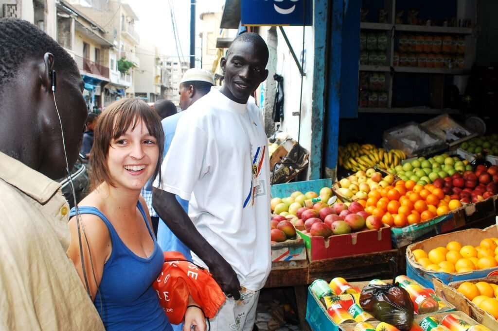 Buying fruit at an african fruit stand in Senegal Dakar